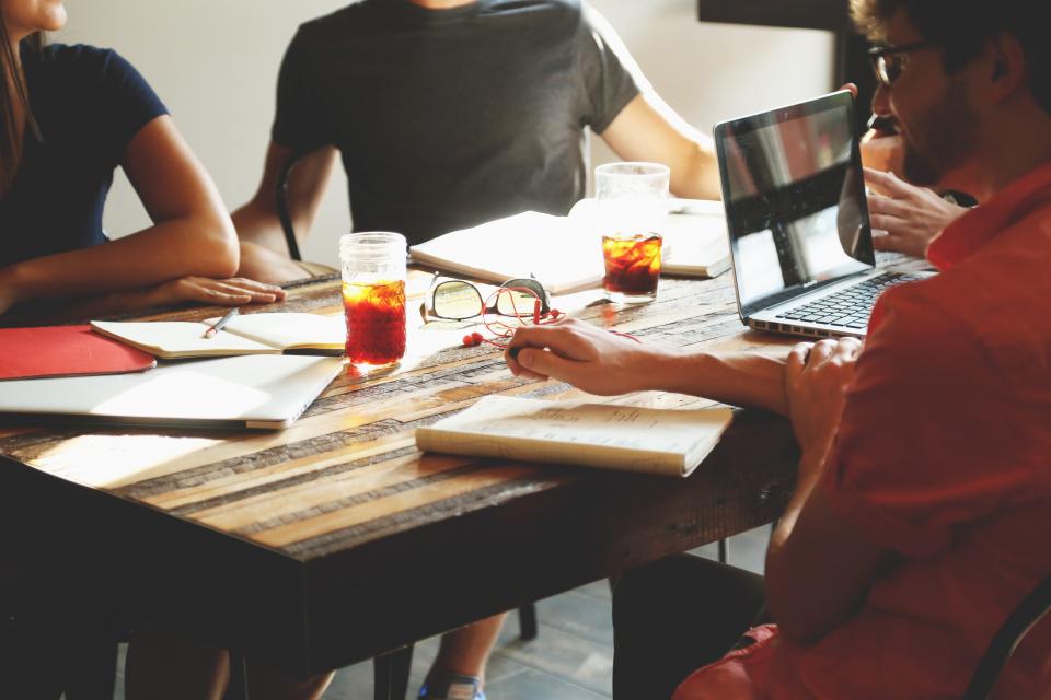 A team working around a meeting-room table